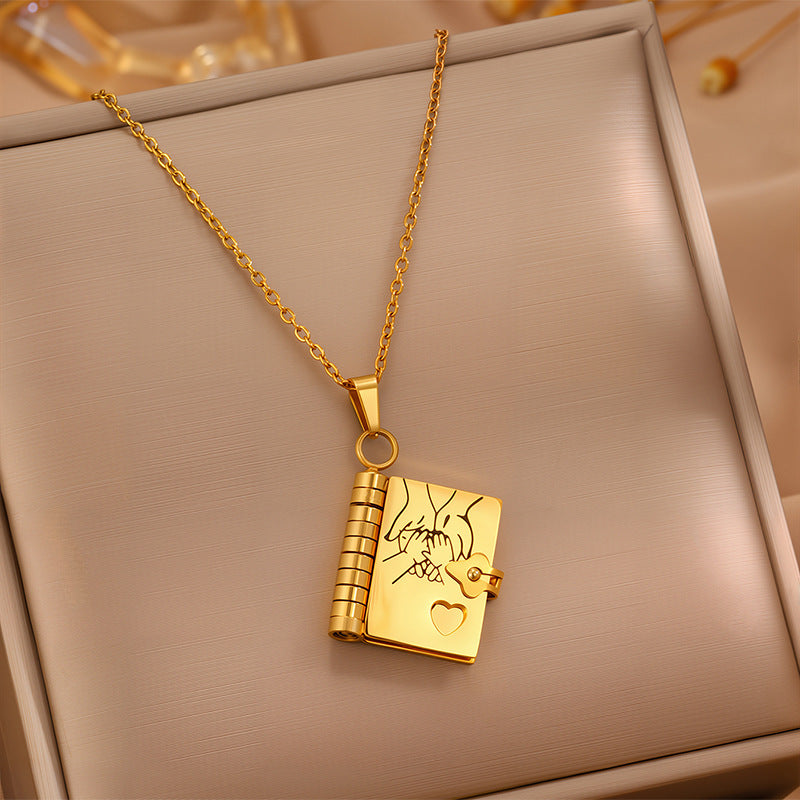 Gold To My Love book locket on its chain