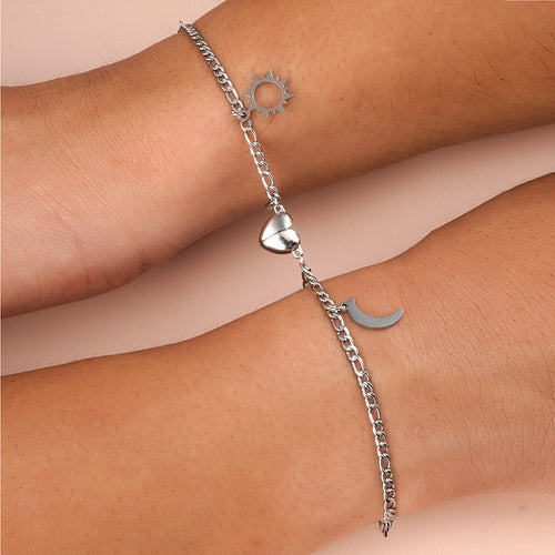 Sun and Moon bracelets worn on two wrists